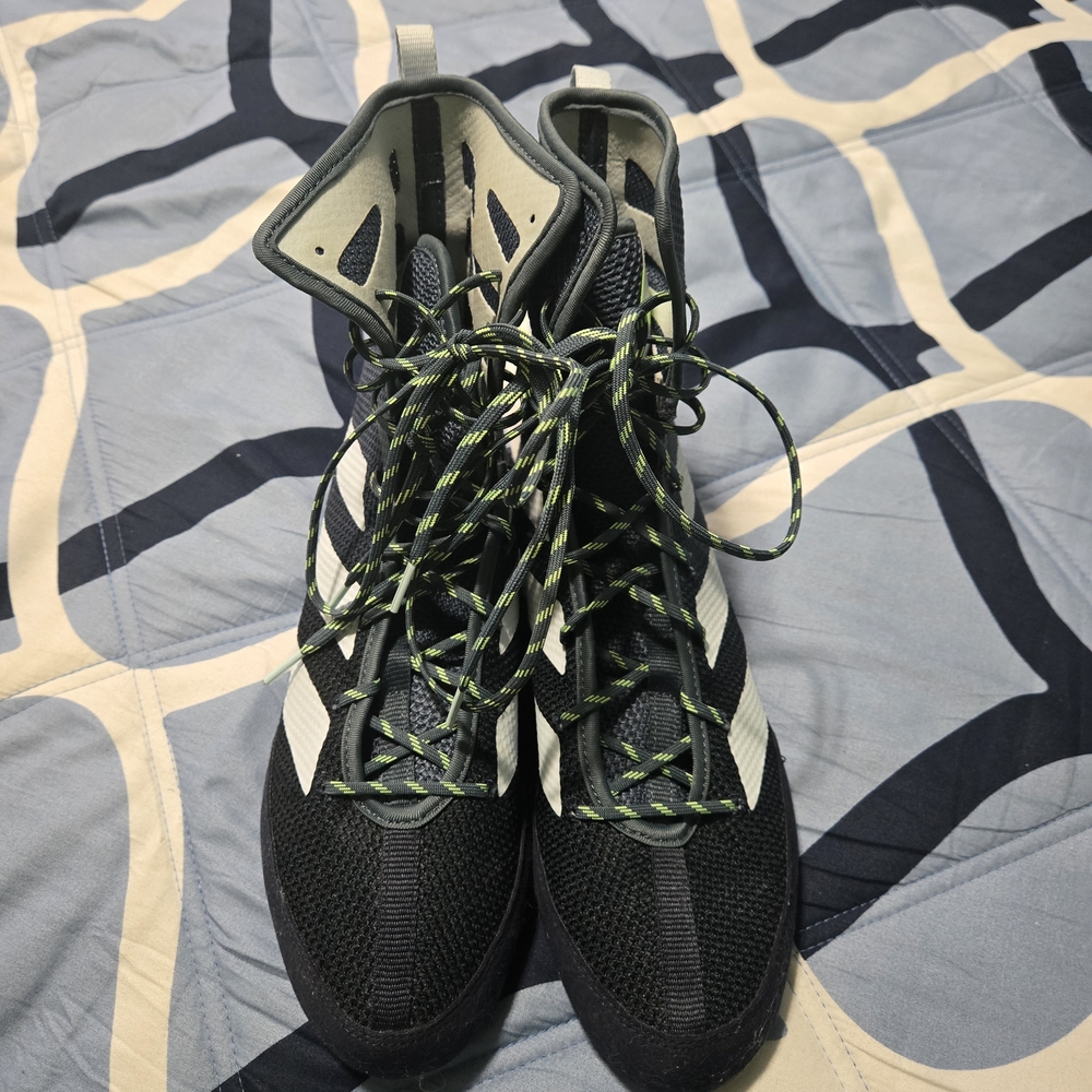 High-Top Black and White Sneakers with Green Laces